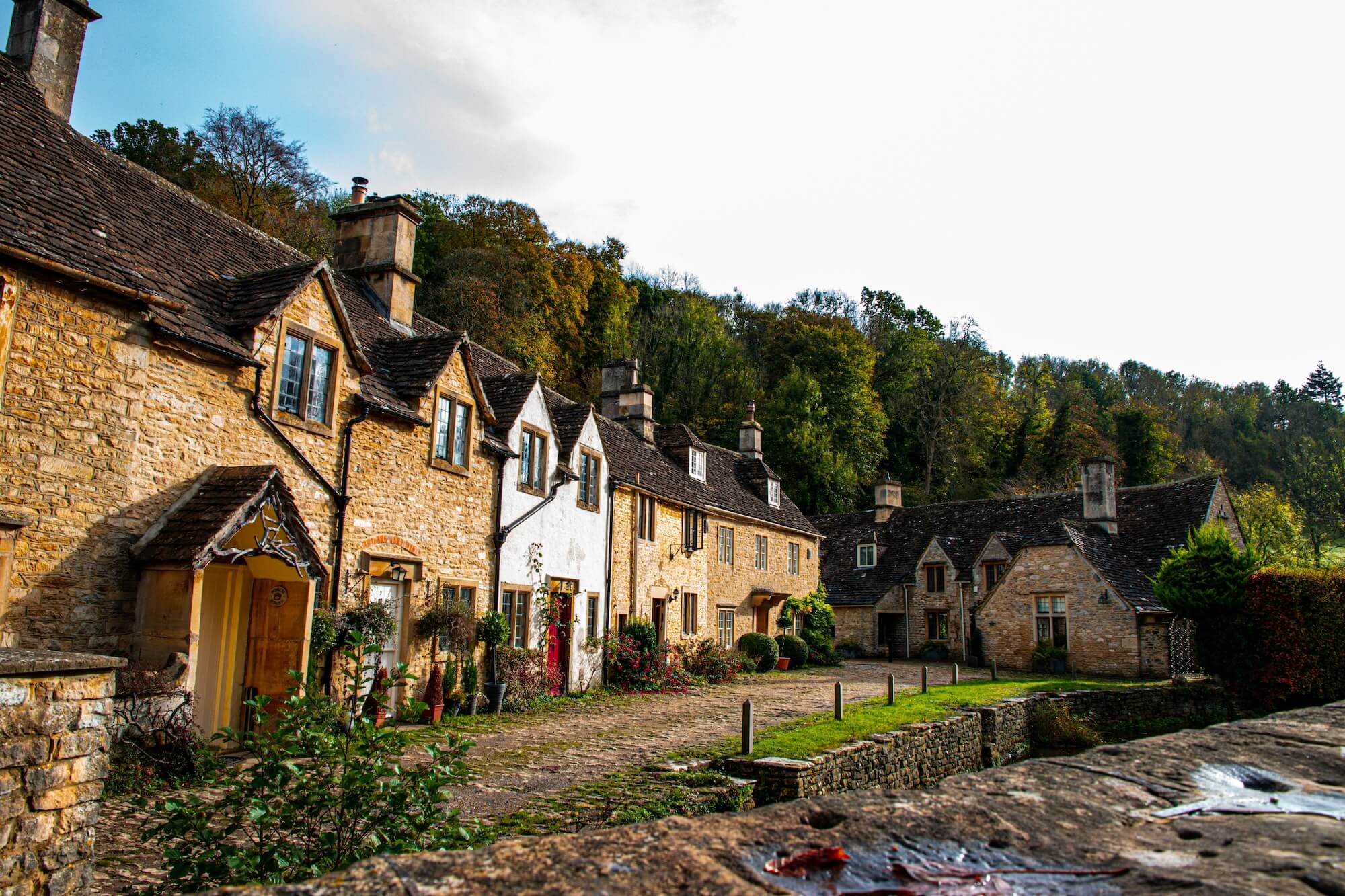 Autumn light on the honey-coloured cottages of Castle Combe